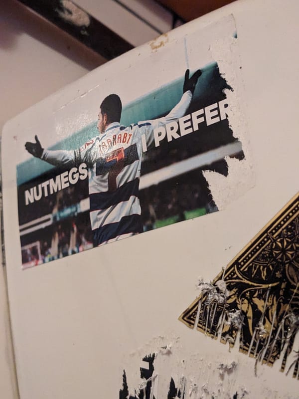 Sticker in a dive bar bathroom stall that says "nutmegs I prefer" 